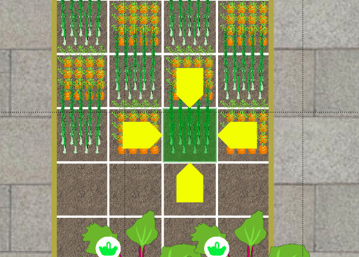 Yellow planting handles used to extend out the planting block in our vegetable garden planner