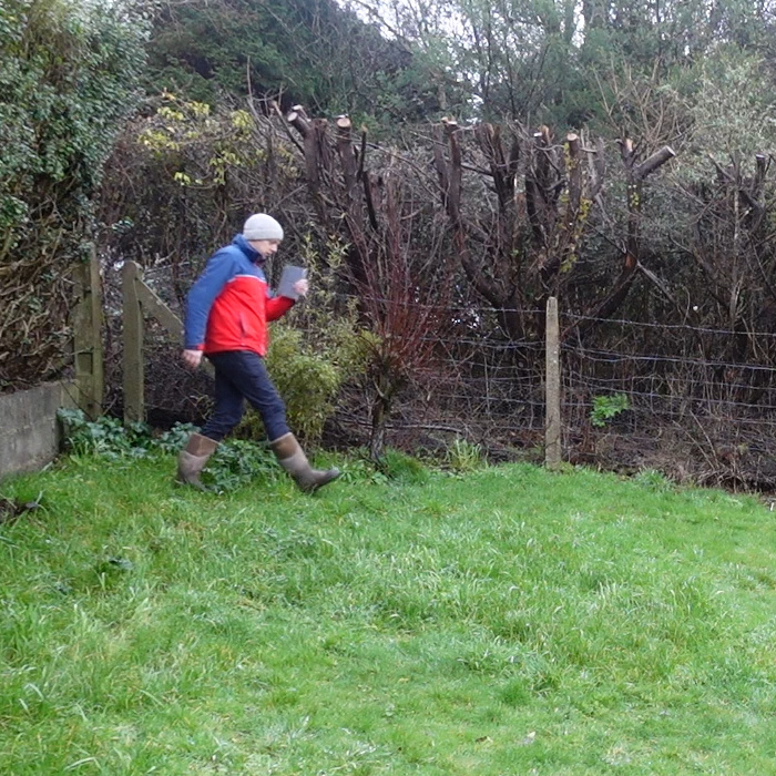 Richard striding out the distances in his garden